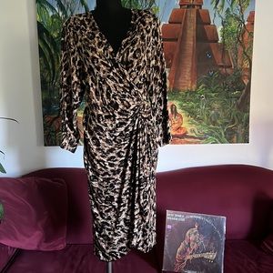 Vintage Bloomingdale’s silk embossed leopard print cocktail dress. Size 10